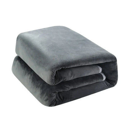 Grey tweed electric heating blanket showing 150cm width and UK plug compatibility