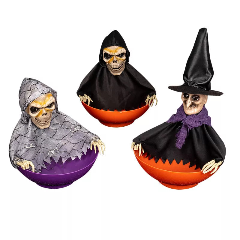 Electrically illuminated Halloween skull candy organizer with sound effects and swinging motion