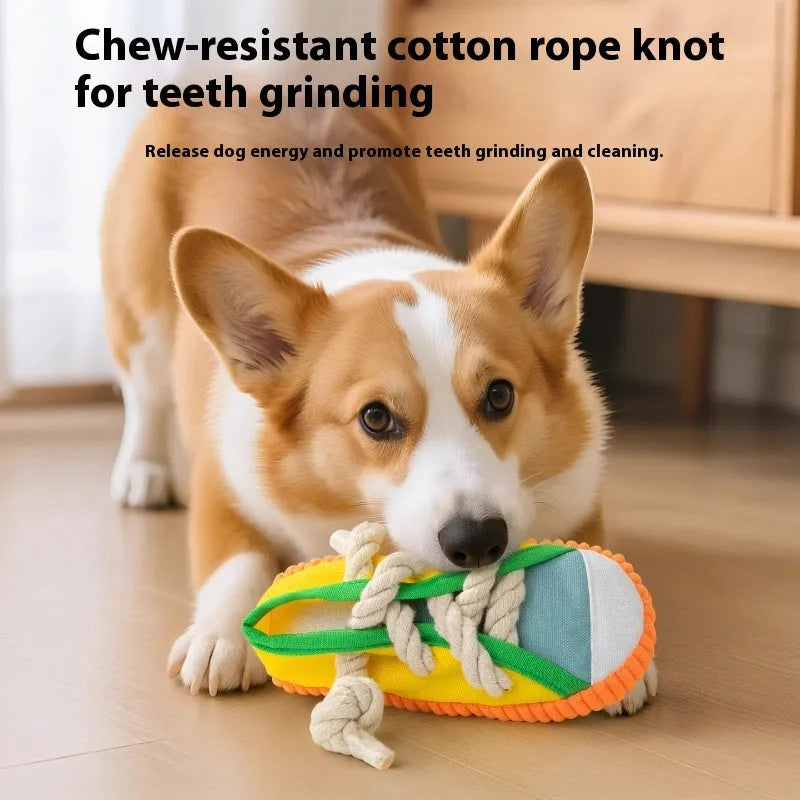Durable plastic dog chew toy in slipper shape with bends, in yellow, black, or blue.