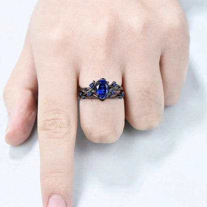 Geometric gun black couple ring with navy blue rhinestones on copper base
