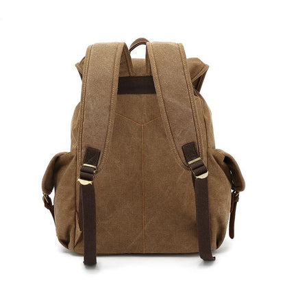 Retro canvas backpack in army green with antique bronze hardware, showing front compartments and size.