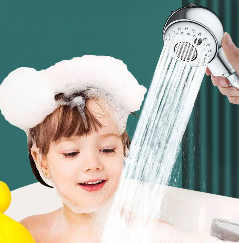 Small silver handheld shower head for gentle washing of pets and babies.