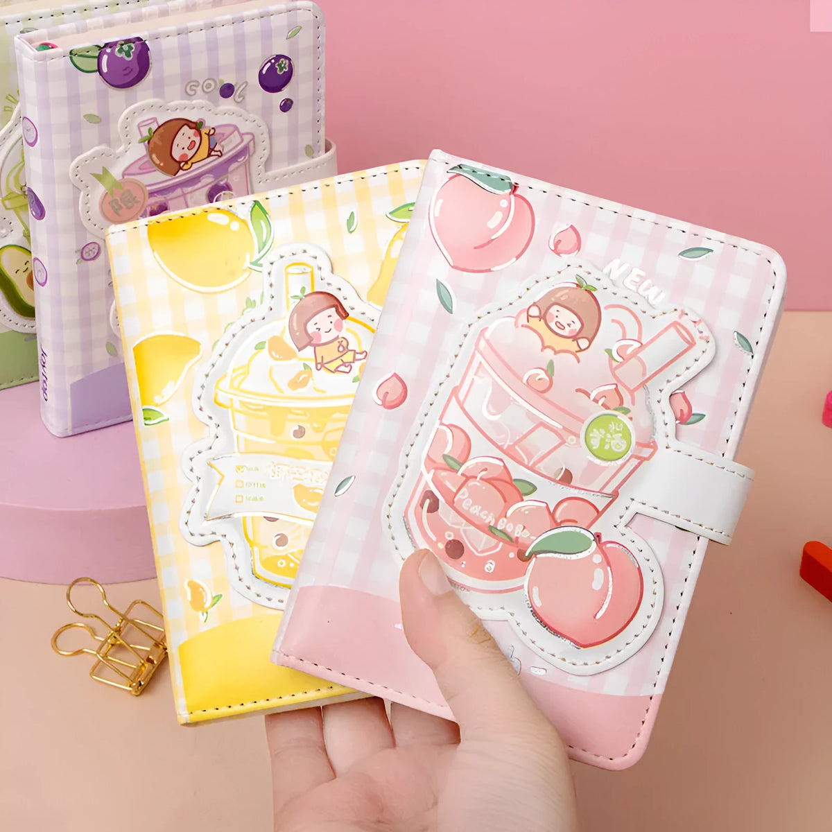 Magnetic buckle notebook hand ledger in pink, yellow, green, and purple with paper pages