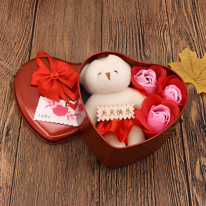 Handmade soap flower gift box in red heart-shaped tin with three blooms and bear, 12x12x5 cm for Valentine's Day