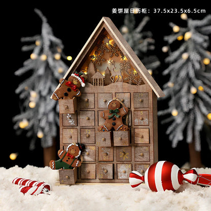Wooden Christmas advent calendar with 24 numbered compartments in red and green colours measuring 37x32cm