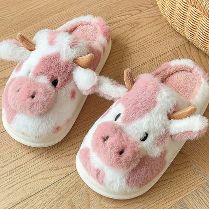 Cartoon cow plush slippers in black, leather red, and brown with non-slip soles
