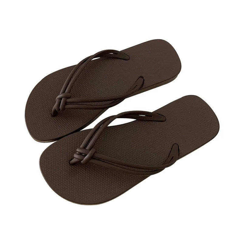 PVC injection moulded flip flops in toe-covering casual style with non-slip sole