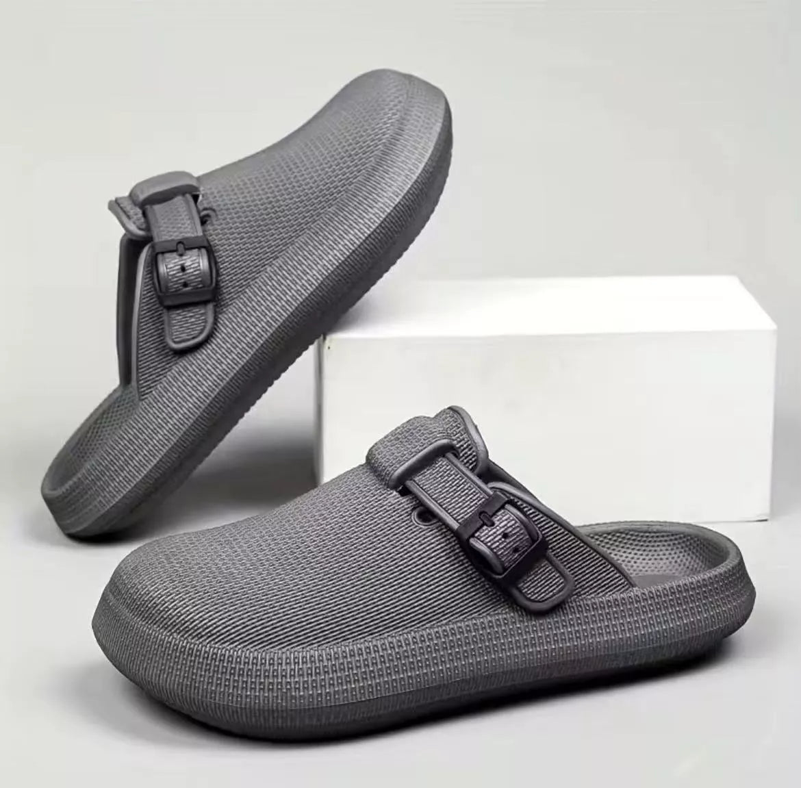 Lightweight EVA indoor home slippers in black, gray, and white