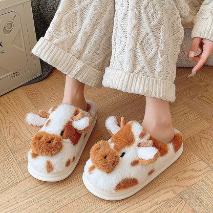 Cartoon cow plush slippers in black, leather red, and brown with non-slip soles