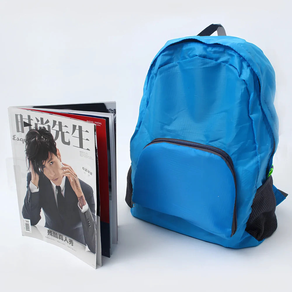 Yellow foldable sports backpack showing 30.5x42cm dimensions and compression feature