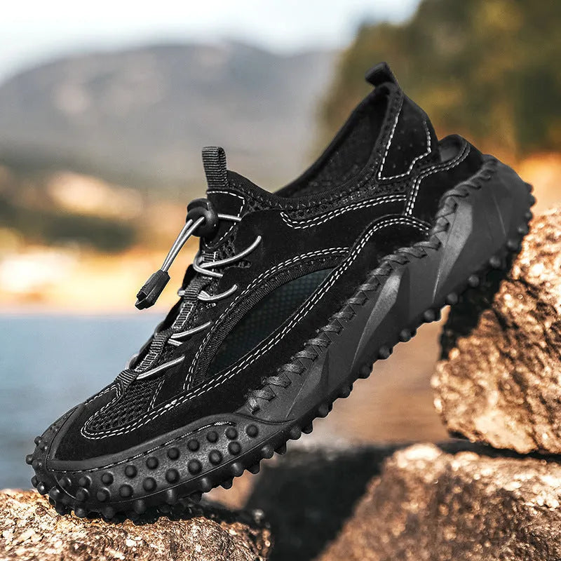 Men's black waterproof sports sandals with leather mesh upper, elastic band, and rubber sole.