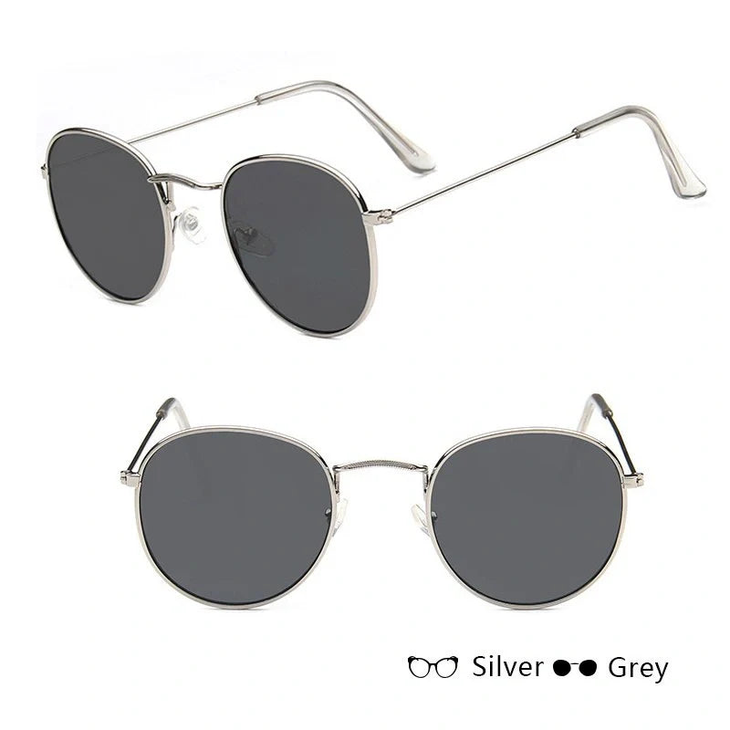 Stylish women's retro sunglasses with round frame and metal finish