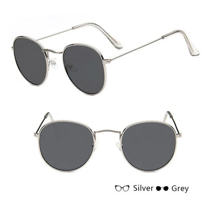 Stylish women's retro sunglasses with round frame and metal finish