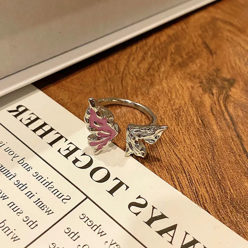 Copper women's ring with Chinese butterfly design and adjustable open loop.
