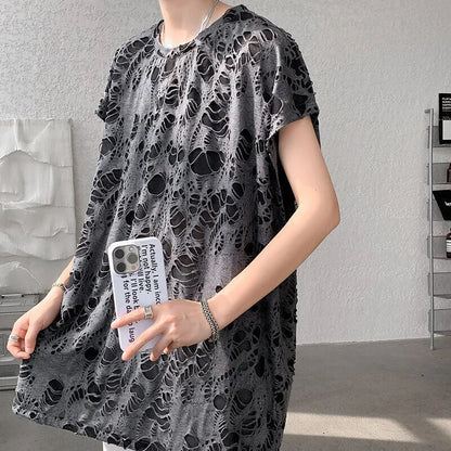Black sleeveless vest with distressed hole detailing and wide shoulder loose fit