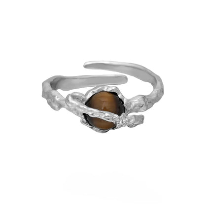 Silver saturn open ring with adjustable opening in white gold colour finish featuring tigereye design elements