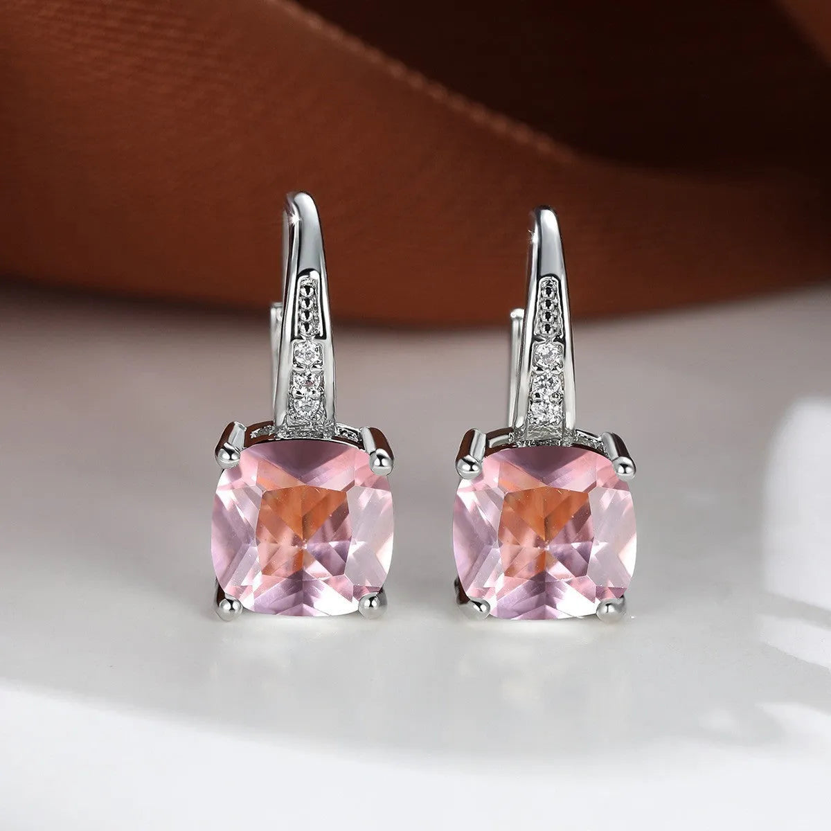 Square zircon inlaid ear hook earrings with geometric design and electroplated finish in golden tone