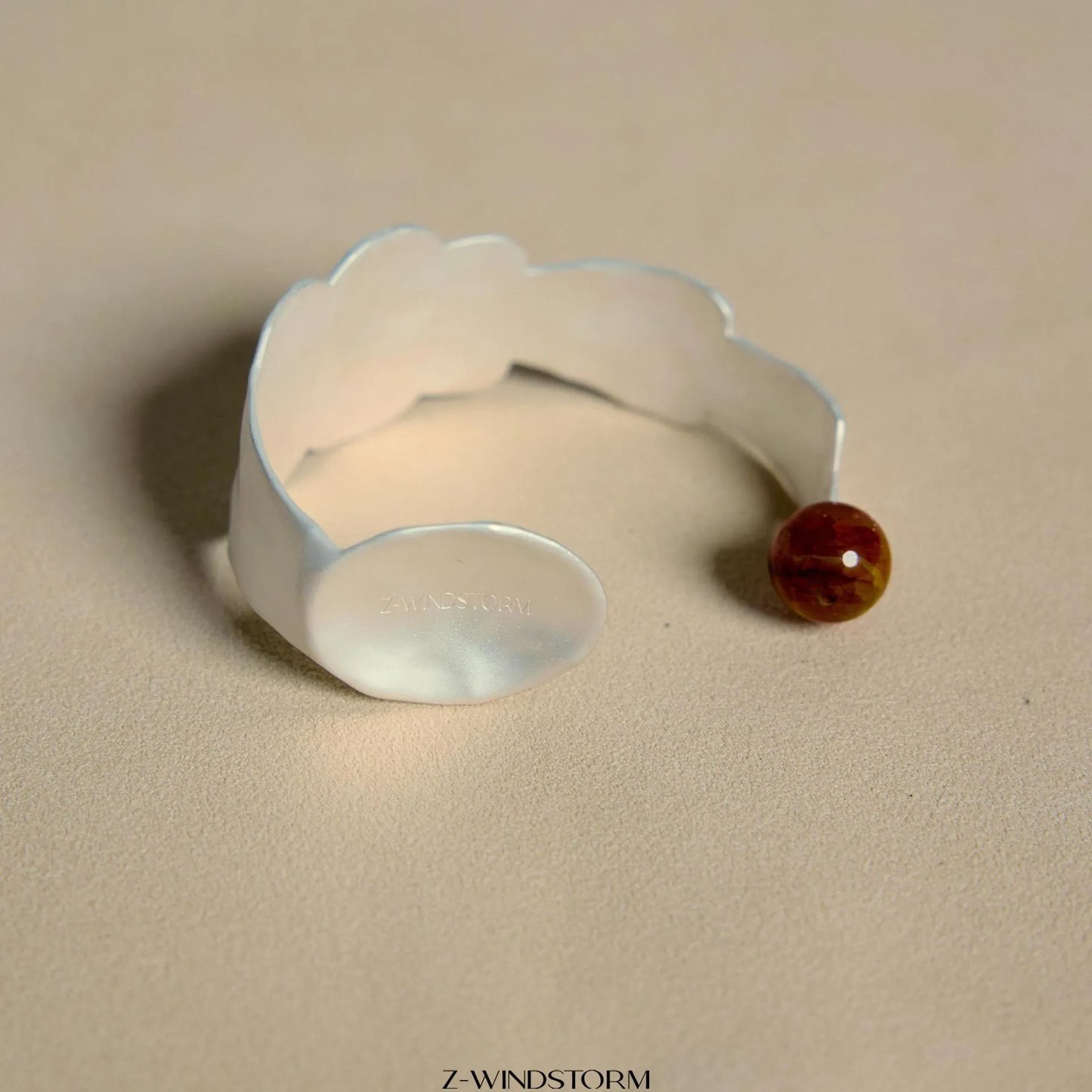 Electroplated alloy ring and bracelet with spoon and pork motifs and diamond shapes