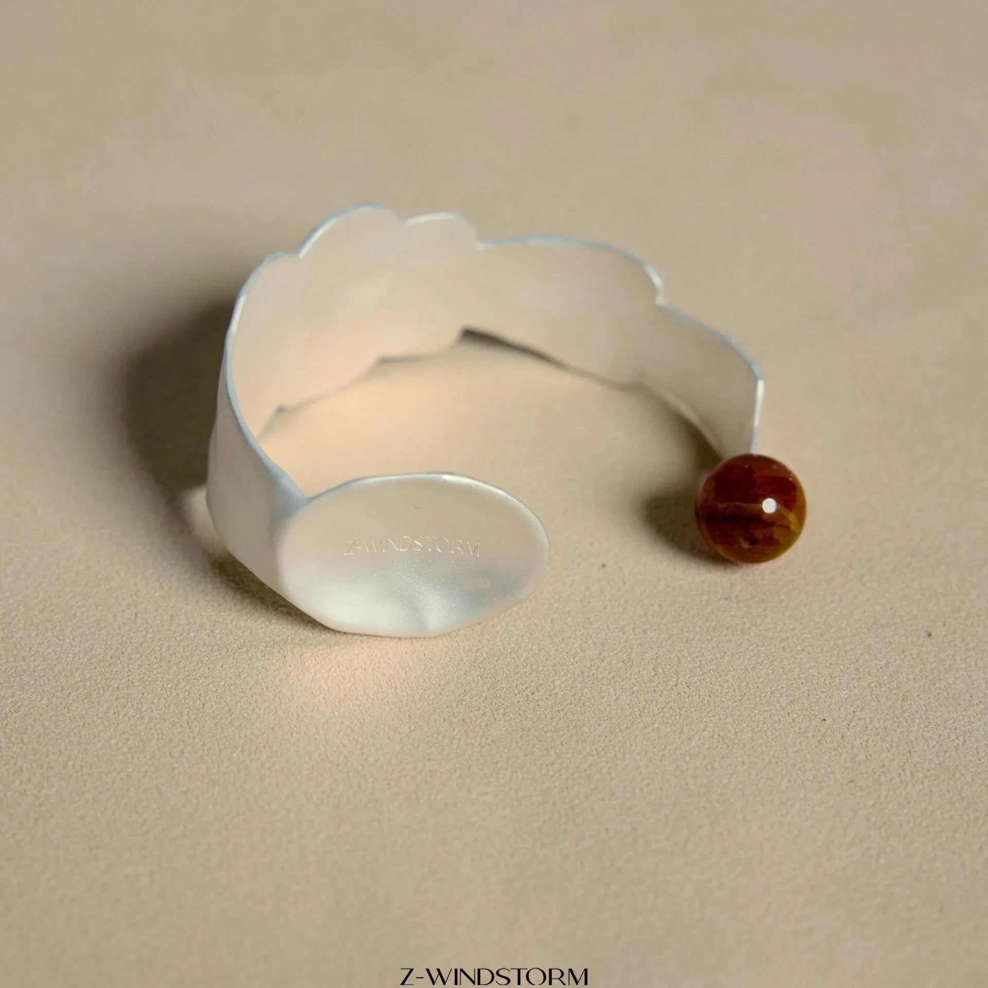 Electroplated alloy ring and bracelet with spoon and pork motifs and diamond shapes