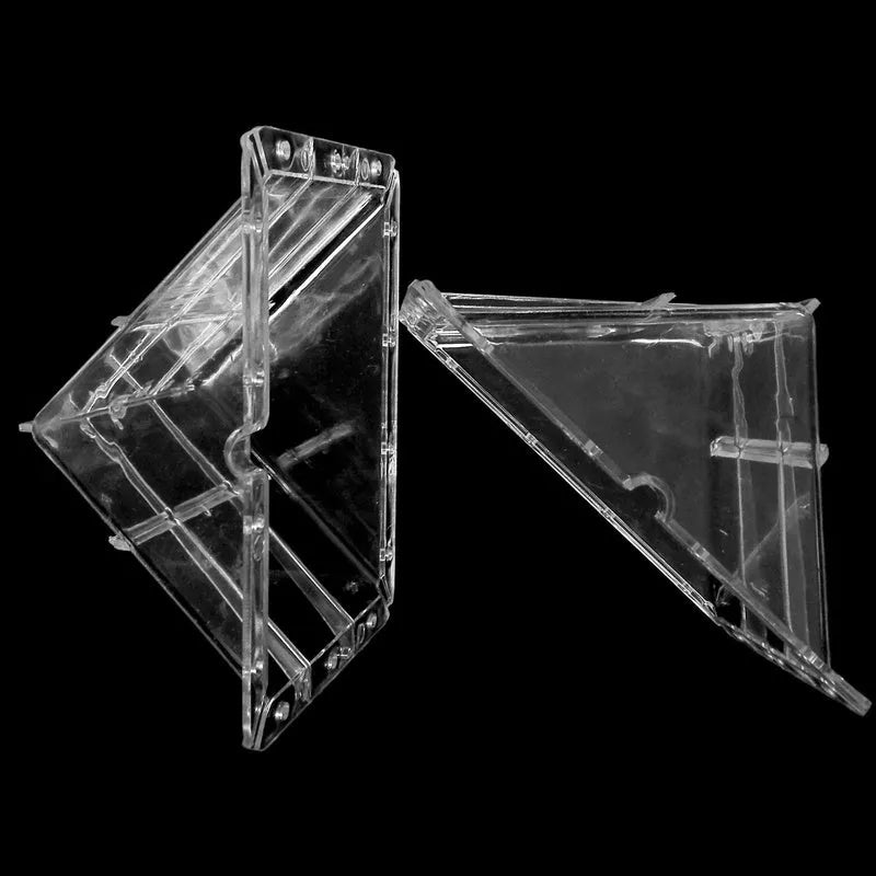 A square white plastic mould for growing square watermelons and fruit, measuring 13cm on each side.