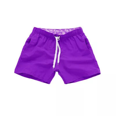 Men's summer surf shorts in various colors, made from 100% polyester for quick drying and durability