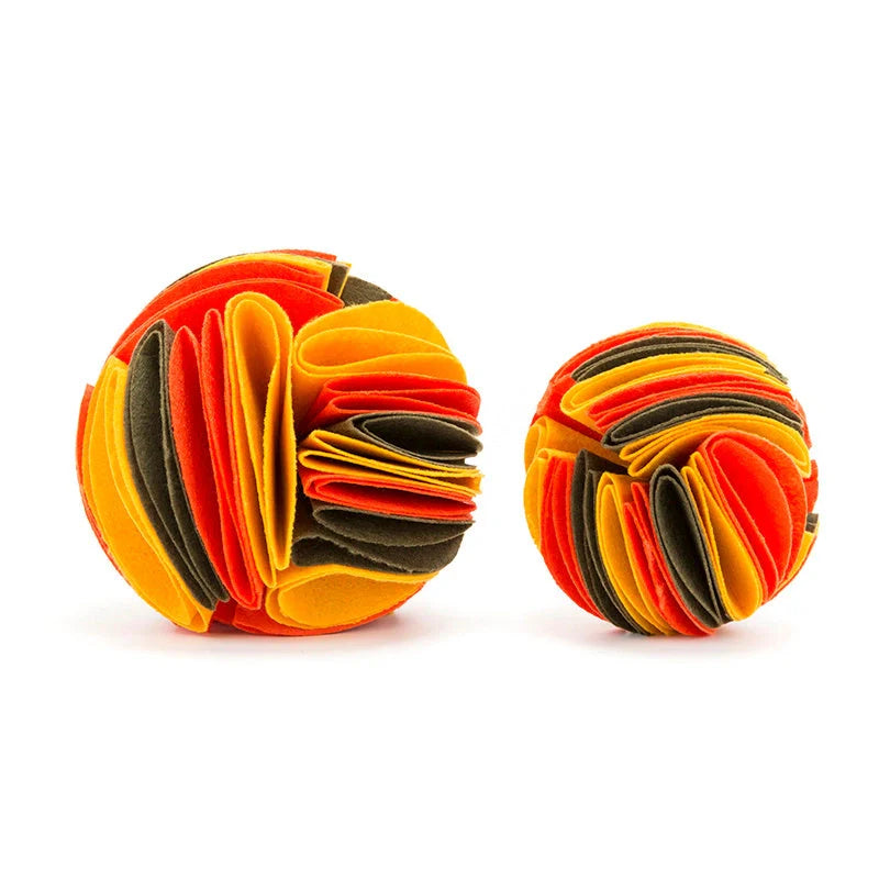 Foldable Dog Snuffle Ball Training Toy in various colors and sizes