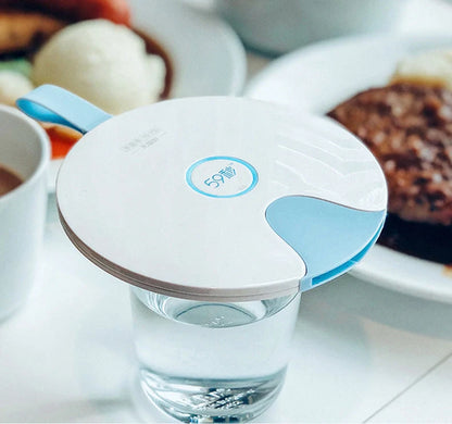 Compact USB-powered baby bottle sterilizer in blue and pink options