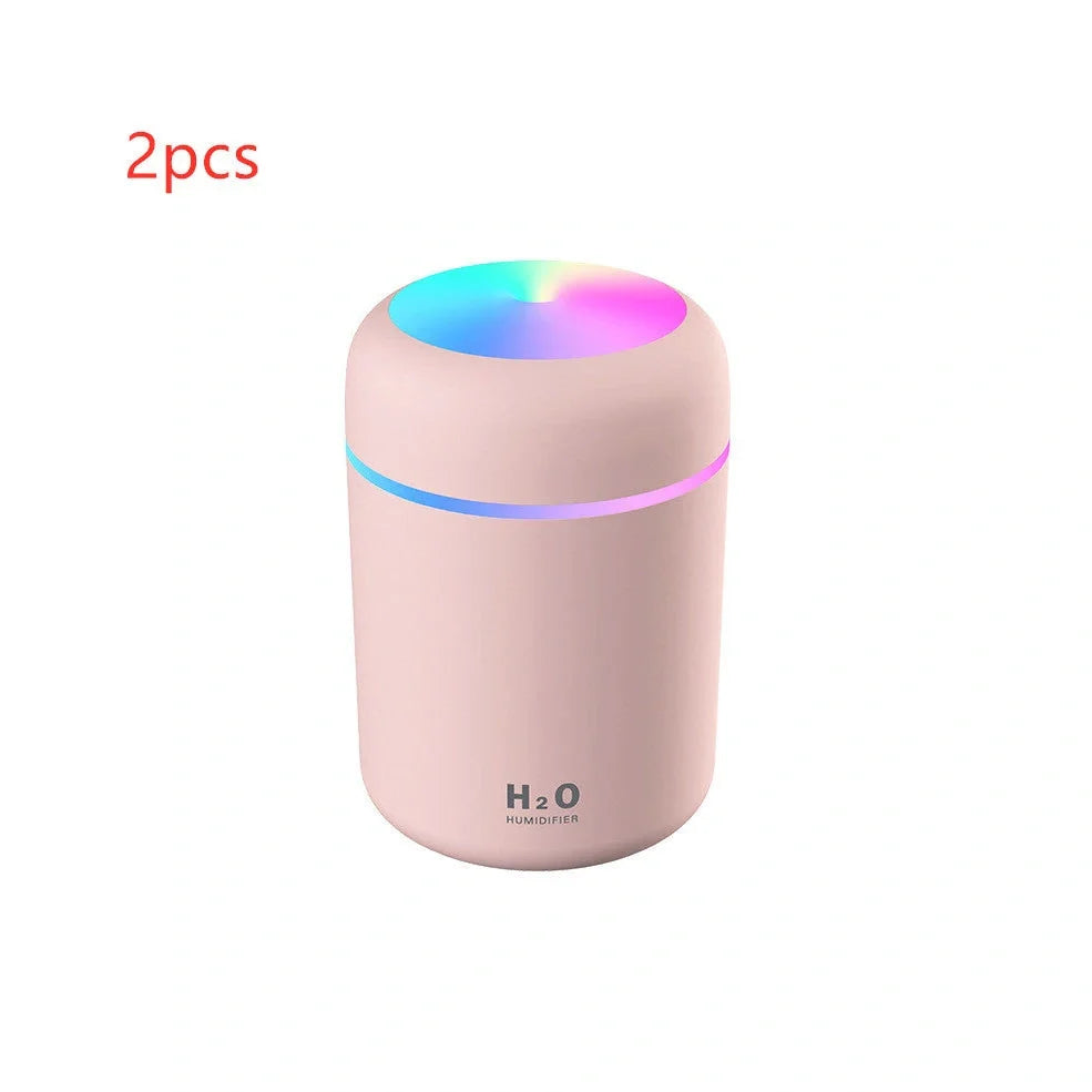 Compact USB car humidifier with colourful LED light and 300ml water tank for vehicle use