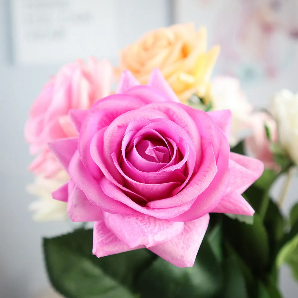 Artificial silk touch rose with fabric petals, approximately 42cm long, in a selection of colours