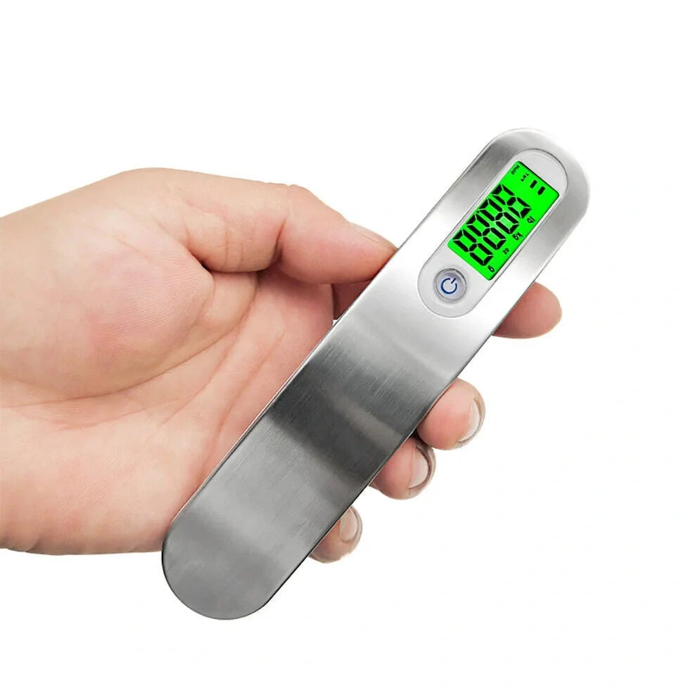 Silver digital luggage scale with LCD display showing weight measurement and integrated hanging belt