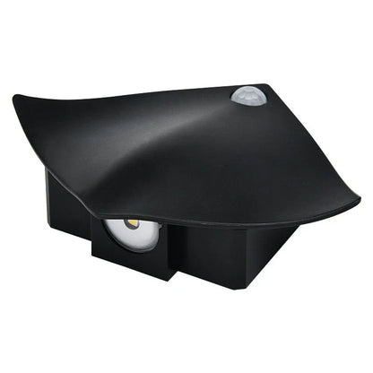 Wireless motion-activated wall lamp with USB recharging, available in black or white finish