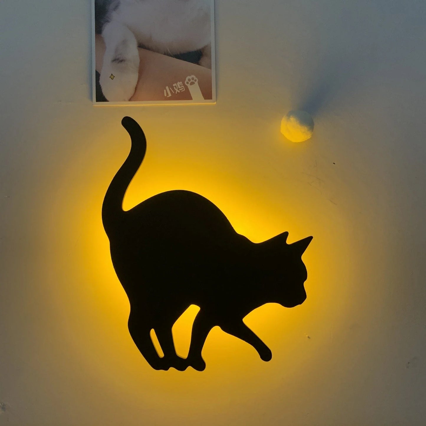 Illuminating pet-themed night light with smart sound sensor and customizable design
