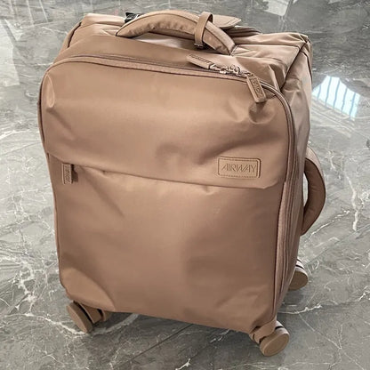 Ultra-light waterproof Oxford cloth suitcase in bluestone green with universal wheels and breathable lining