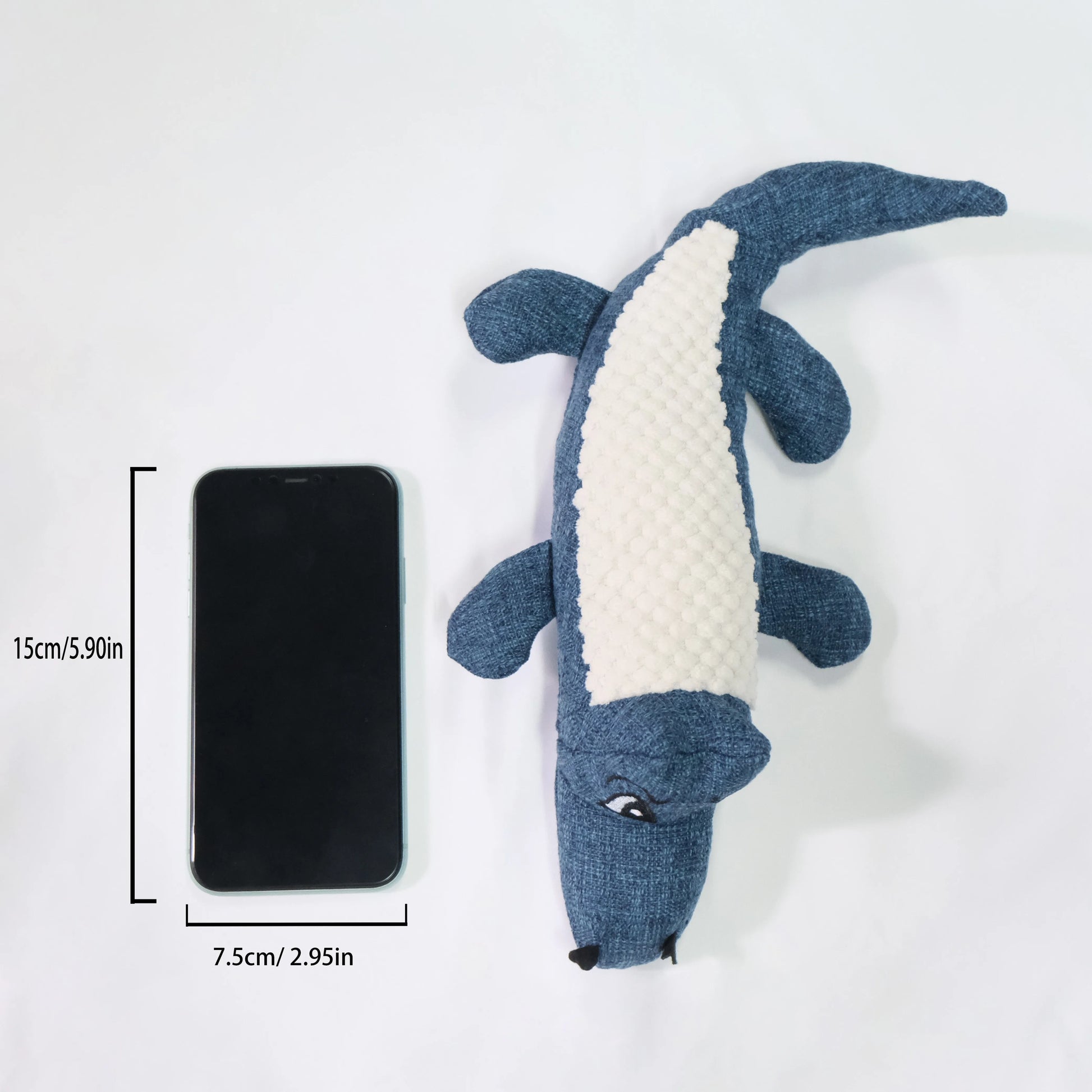 Blue, green, and red corn grid plush pet toy with squeaker for cats and dogs.