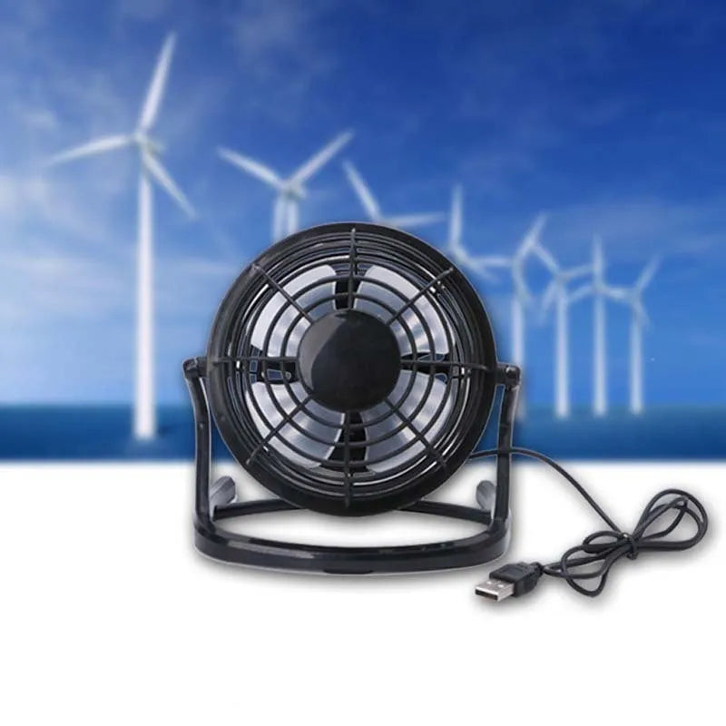 Black mini USB fan with adjustable angle mechanism and 96mm blades on desk