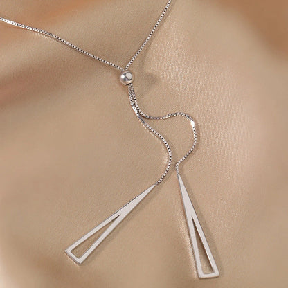 Sterling silver geometric triangle necklace with adjustable clavicle chain in white K