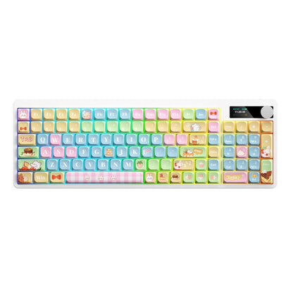 Black iron cow layout mechanical keyboard with RGB backlighting on a desk.