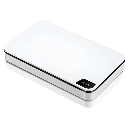 White multifunctional wireless phone charger and ultraviolet air steriliser unit with remote control.