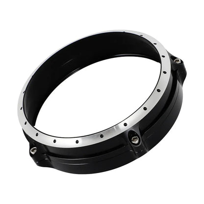 Black CNC aluminium headlight protective frame for BMW R NineT Scrambler motorcycle.