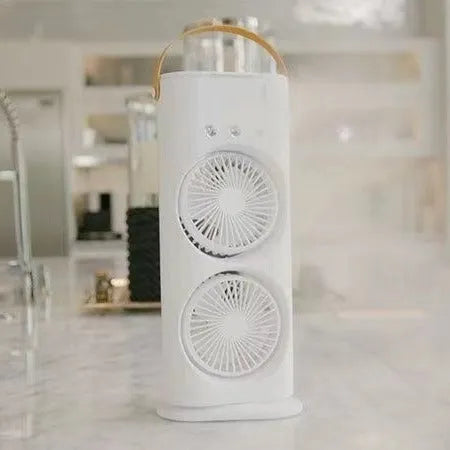 White portable humidifier fan with double heads and remote control on a table
