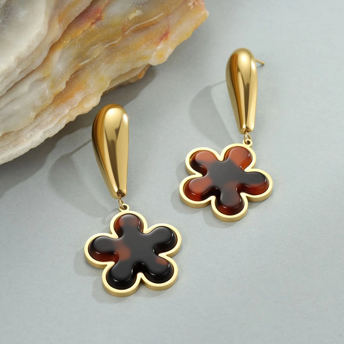 Women's tortoiseshell resin hawksbill colour earrings with 18K gold electroplating on stainless steel, showing heart-shaped and floral designs