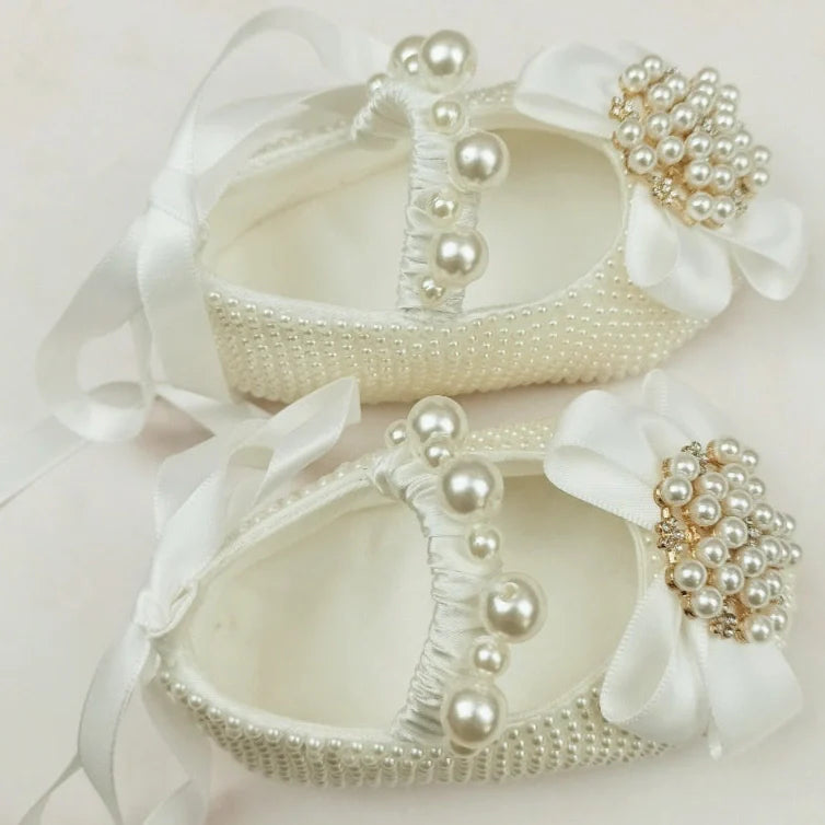 Handmade milky white cloth shoes with lace-up closure and matching fabric headband
