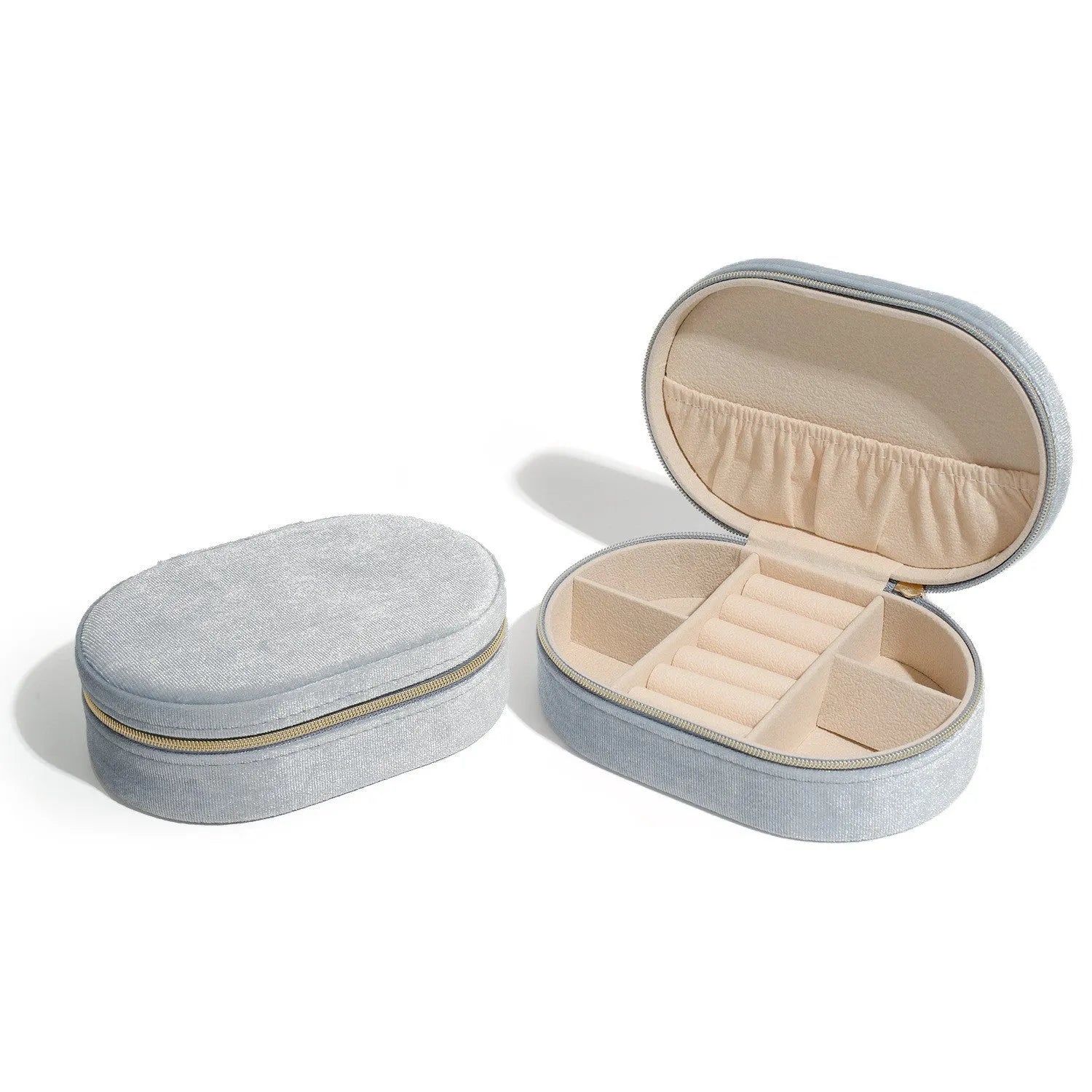 Oval velvet jewellery storage box with flannel lining in lake blue colour showing 15x10x5cm dimensions