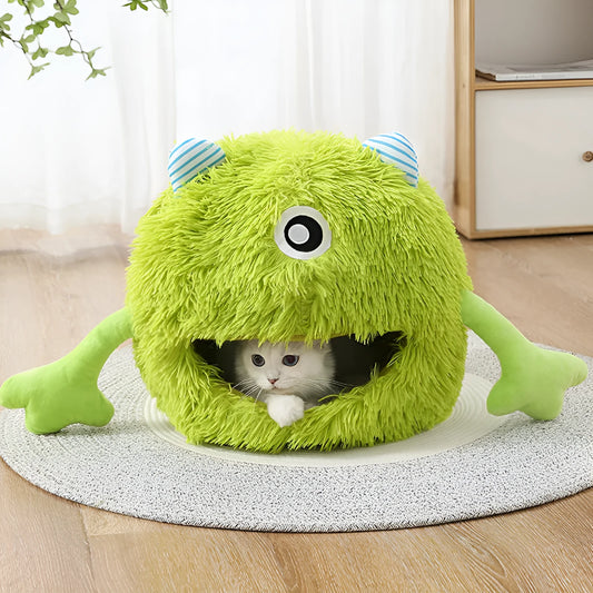 Round fluffy plush cat bed with a non-slip bottom, shown in a medium 40cm size on a wooden floor.