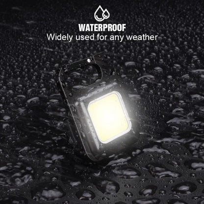 Black aluminium alloy USB rechargeable keychain light with magnetic base and foldable handle