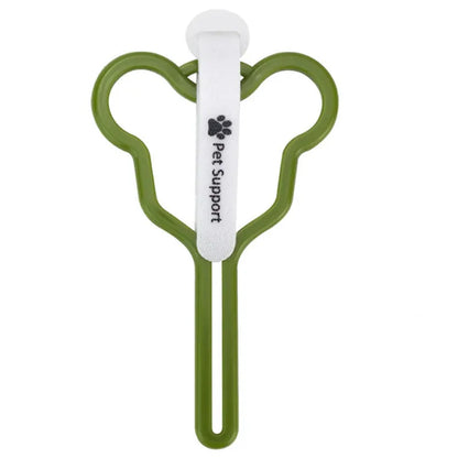 A dog poop bag dispenser with a hands-free clip and adjustable Velcro strap attached to a dog lead.
