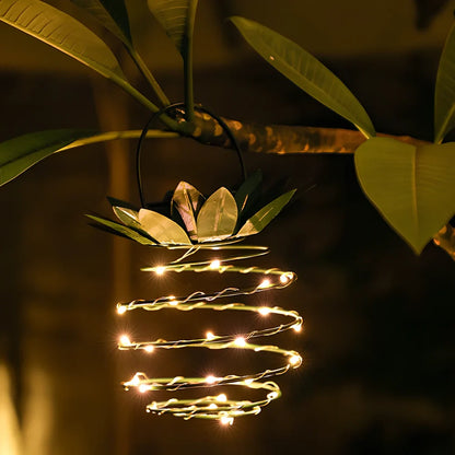 Pineapple-shaped solar garden light with LED illumination and waterproof housing for outdoor use