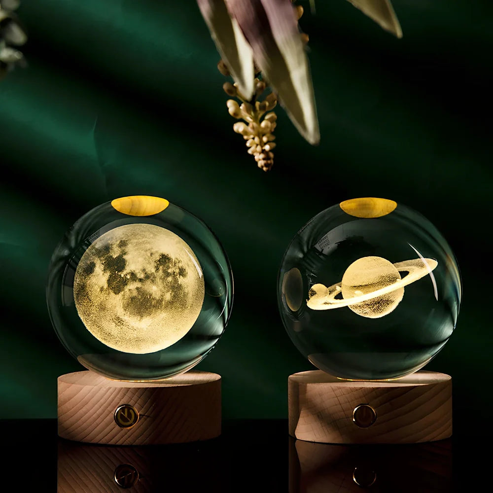 Transparent crystal ball with 3D laser inner carving of galaxy patterns on charging base