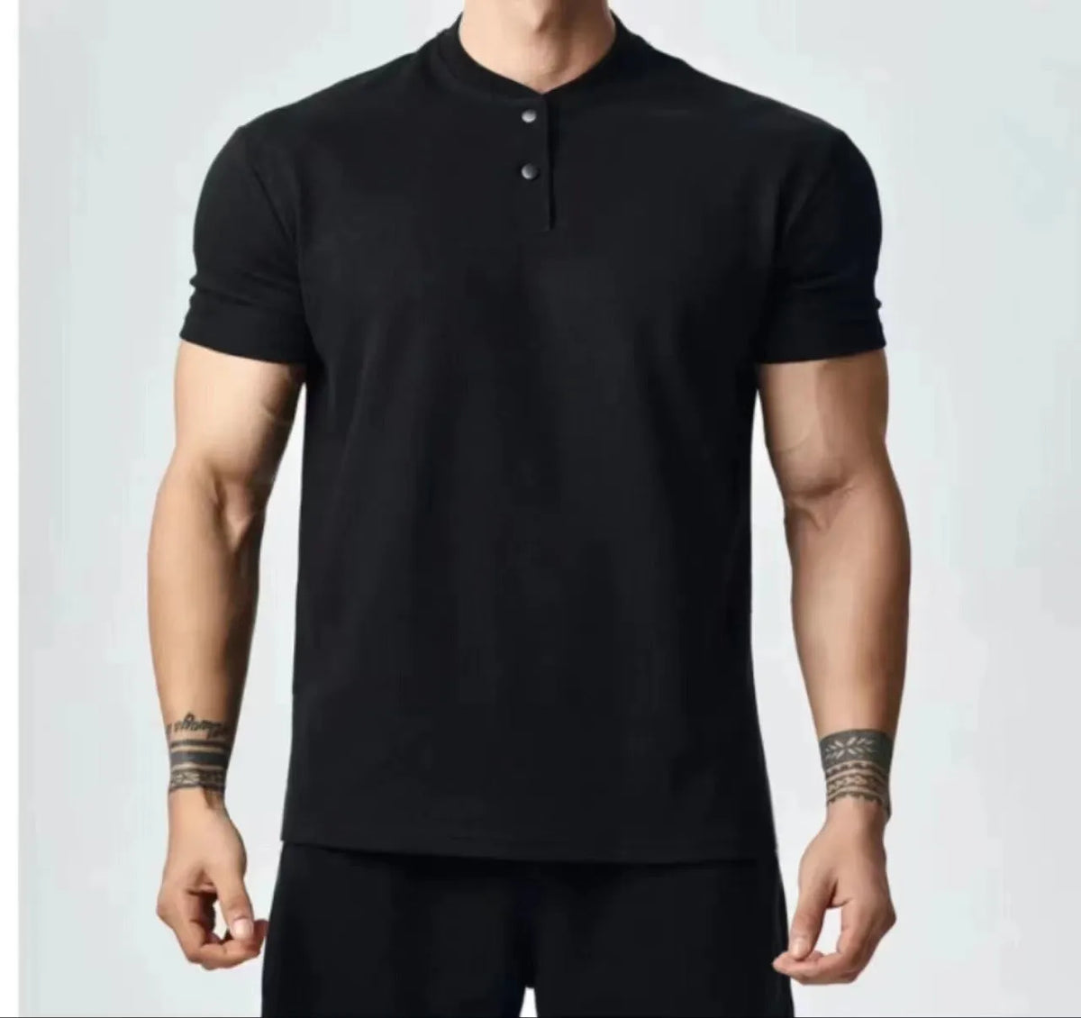 Men's loose fit retro T-shirt shown in black with a Henry collar on a mannequin.