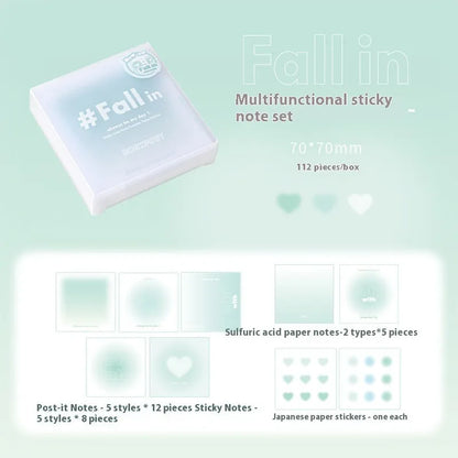 Square gradient-cover notepad showing pastel colours, open to reveal sticky notes, plain paper, and parchment sheets.